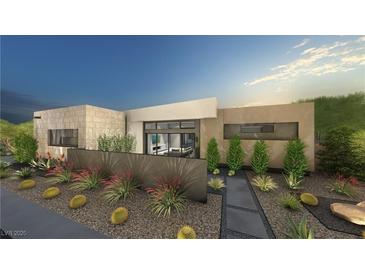 Modern home with desert landscaping, including cacti, succulents, and decorative rock at 7047 Nomi Ct, Las Vegas, NV 89120