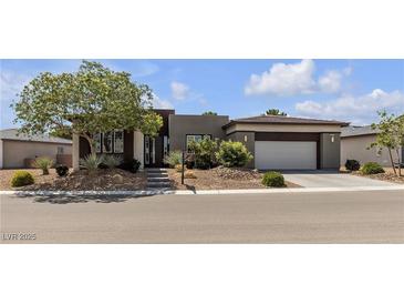 Charming single-story home with well-maintained landscaping and an attached two-car garage at 4829 E Beacon Ridge Dr, Pahrump, NV 89061