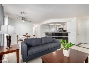 Inviting living room with comfortable seating, bright lighting, and stylish accents, perfect for relaxation and entertaining at 8600 W Charleston Blvd # 2085, Las Vegas, NV 89117