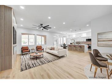 Bright, open-concept living area with modern furnishings and decor at 2353 Lauren Dr, Las Vegas, NV 89134