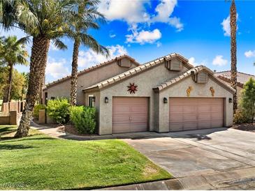 Charming home with a two-car garage and well-maintained landscaping in a beautiful neighborhood at 1131 Golf Club, Laughlin, NV 89029