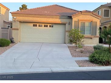 Charming single-story home with a two-car garage and low maintenance desert landscaping at 3809 Van Ness Ave, North Las Vegas, NV 89081