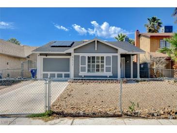 Charming single-story home with a fenced yard and modern architectural details at 5417 Eastbrook Dr, Las Vegas, NV 89142
