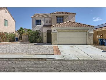 Charming two-story home with a two car garage and desert landscaping at 7382 Elbridge Way, Las Vegas, NV 89113