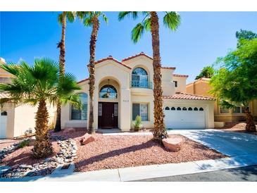Charming two-story home with well-maintained landscaping and a welcoming front entrance at 9413 Cedar Heights Ave, Las Vegas, NV 89134