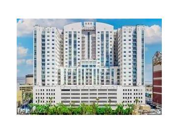 Striking, modern condominium with a beautiful architectural design on a sunny day at 150 Las Vegas Blvd # 1004, Las Vegas, NV 89101