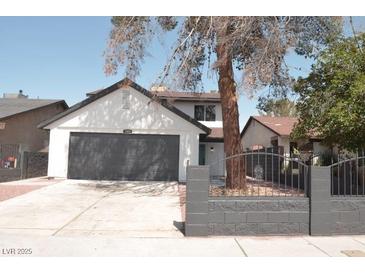 Charming two-story home with a well-maintained yard and a spacious driveway at 1805 Amboy Dr, Las Vegas, NV 89108