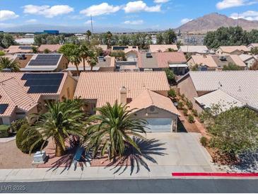 Charming single story home with desert landscaping and an attached two car garage at 6292 Belgium Dr, Las Vegas, NV 89122