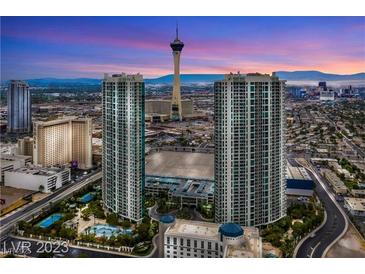 Stunning aerial view of Las Vegas condos, the Strip and the surrounding cityscape at sunset at 322 Karen Ave # 601, Las Vegas, NV 89109