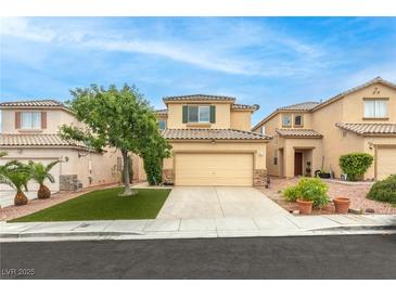 Charming two-story home with a well-manicured front yard and inviting curb appeal at 8221 Stoneheather Ct, Las Vegas, NV 89117
