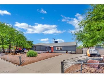 Charming single-story home featuring a well-maintained yard and a welcoming front entrance at 4419 Lorna Pl, Las Vegas, NV 89107