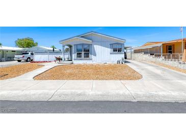 Charming single-story home with a well-maintained yard and a private driveway at 1290 Dalene Ave, Henderson, NV 89002