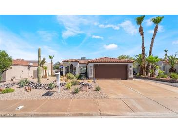 Charming single story home with desert landscaping, sidewalk, and beautiful front yard appeal at 444 Viewmont Dr, Henderson, NV 89015