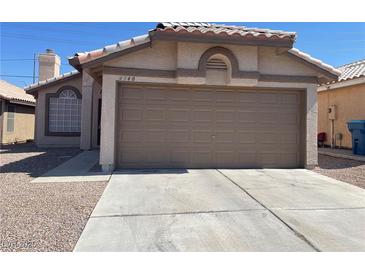 Charming single-story home featuring a two-car garage and low-maintenance desert landscaping at 6340 Cranberry Ln, Las Vegas, NV 89156