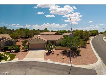 Charming single-story home featuring a well-maintained landscape and an attached two-car garage at 1620 Fieldbrook St, Henderson, NV 89052