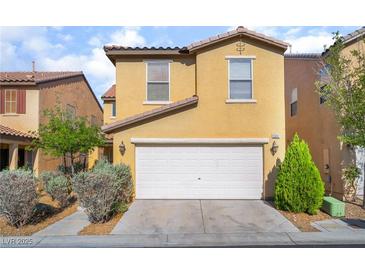 Charming two-story home with a two-car garage and well-maintained landscaping at 5641 Vassar Meadow St, Las Vegas, NV 89148