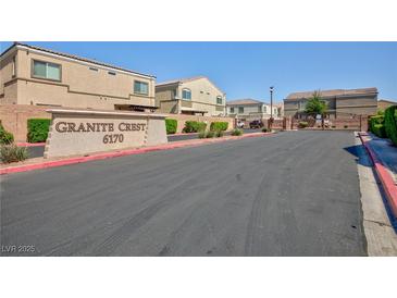 Granite Crest community entrance featuring desert landscaping and gated access at 6170 E Sahara Ave # 1076, Las Vegas, NV 89142