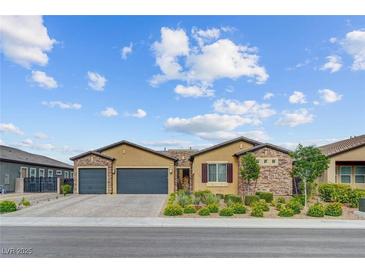 Charming single-story home with a two-car garage and manicured landscaping at 7036 Winstar St, Las Vegas, NV 89131