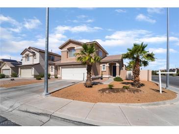 Charming two-story home with a well-manicured front yard and an attached two-car garage at 7288 Quarterhorse Ln, Las Vegas, NV 89148