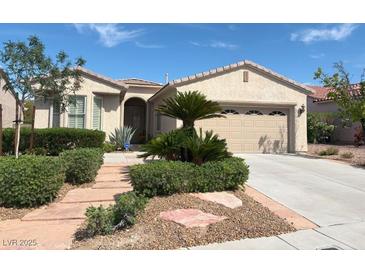 Charming single-story home boasts desert landscaping, a two-car garage, and a welcoming front entrance at 5110 Silenzio St, Las Vegas, NV 89135