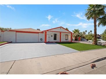 Charming single-story home featuring a well-maintained front yard and ample parking at 5375 Chestnut St, Las Vegas, NV 89119