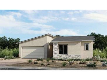 Beautiful single-story home with desert landscaping, a two-car garage, and stone accents at 12212 Elderwood St, Las Vegas, NV 89138