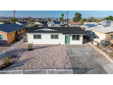 Charming single-story home with fresh exterior paint and desert landscaping at 1436 Chestnut St, Henderson, NV 89011