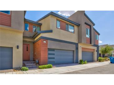 Modern townhouse featuring a two-car garage and contemporary design at 3219 Timorasso Ave, Henderson, NV 89044