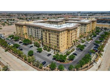 Aerial view of the Boca Raton Residences showing the expansive grounds, lush landscaping, and ample parking at 2405 W Serene Ave # 612, Las Vegas, NV 89123