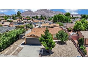Charming single-story home with a well-maintained yard and mountain views at 317 Kane Ave, Las Vegas, NV 89110