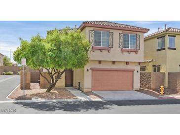 Charming two-story home with a well-maintained front yard and attached garage at 10601 Lessona St, Las Vegas, NV 89141