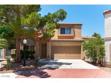 Charming two-story home with a desert landscape and a two car garage at 3425 Yorkminster St, Las Vegas, NV 89129