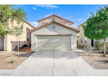 Charming two-story home featuring a spacious two car garage and a well maintained front yard at 9507 Brewing Cloud Ave, Las Vegas, NV 89148