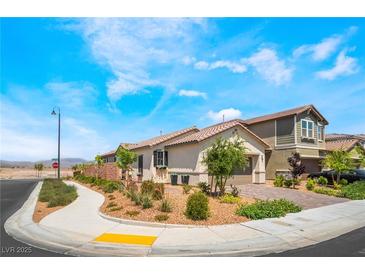 Charming single-story home with desert landscaping and a well-maintained exterior in a sunny setting at 2845 Mincio St, Henderson, NV 89044
