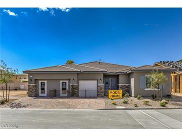 Charming single-story home with stone accents, manicured landscaping, and a 'Model Home' sign at 365 Sapphire Rock Ave, Las Vegas, NV 89183