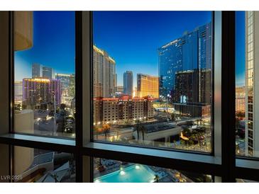 Beautiful city view from the residence featuring the strip's vibrant lights and skyline at dusk at 135 E Harmon Ave # 809, Las Vegas, NV 89109