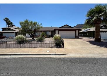 Charming single-story home featuring desert landscaping and a two-car garage at 475 Annapolis Cir, Henderson, NV 89015