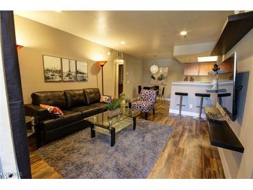 Cozy living room with modern decor, comfortable seating, and stylish accents at 4200 S Valley View Blvd # 1035, Las Vegas, NV 89103