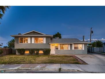 Charming two-story home featuring a well-maintained front yard and inviting curb appeal at 6213 Fairwood Ave, Las Vegas, NV 89107