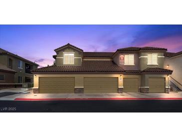 Lovely condo with private garages, tile roof, and neutral color scheme paints a perfect picture of easy living at 6868 Sky Pointe Dr # 2035, Las Vegas, NV 89131