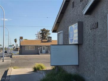 Modest commercial building featuring clean, low-rise construction, and ample parking at 1150 S Eastern Ave # 110, Las Vegas, NV 89104