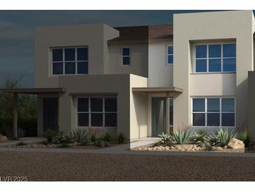 Modern two-story home featuring contemporary architecture and lush landscaping at 1485 Melodic Lark Ln, Las Vegas, NV 89138