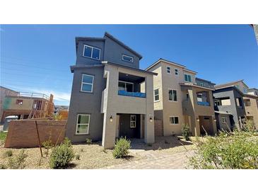 Charming new construction home showcasing modern architecture and desert landscaping at 4684 Parkarbor Ave, Las Vegas, NV 89141