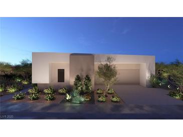 Contemporary home featuring desert landscaping and a neutral color scheme at 25 Sand Star Ln, Henderson, NV 89011
