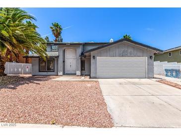 Charming single-Gathering home featuring a well-maintained front yard and an attached two-car garage at 3158 Brockington Dr, Las Vegas, NV 89120