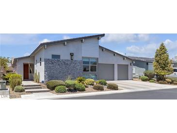 Stunning single-story home with modern architectural details and well-maintained landscaping at 5927 Villa Loma St, Las Vegas, NV 89148