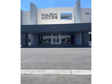 Exterior of the Park House building featuring a modern design and sleek architectural details at 8925 W Flamingo Rd # 105, Las Vegas, NV 89147