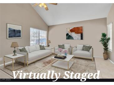 Bright living room featuring neutral walls, vaulted ceilings, and large windows allowing natural light at 7720 Leavorite Dr, Las Vegas, NV 89128