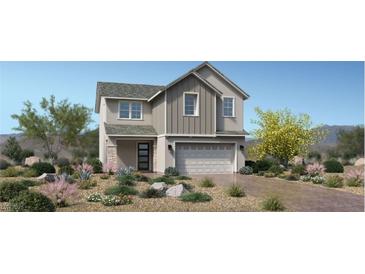 Two story home with attached garage, desert landscaping, neutral colors, and inviting curb appeal at 9027 Rolling Pietra St, Las Vegas, NV 89166
