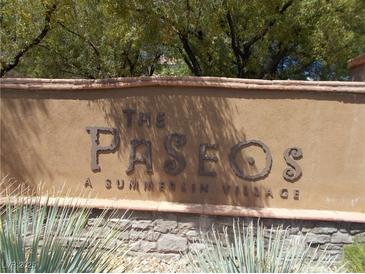 Landscaped community sign reading 